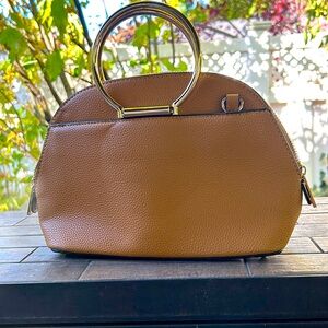 Sondra Robert’s mustard and gold Purse